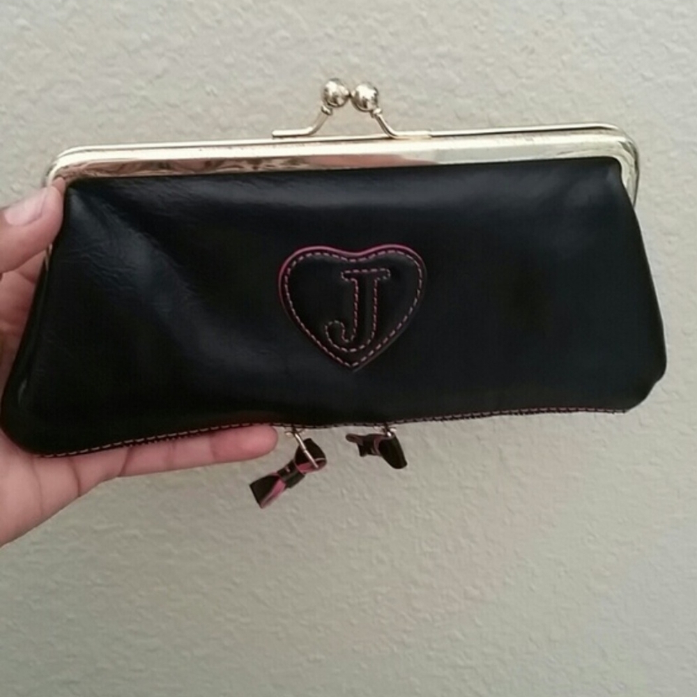Black Clutch with Heart Embellishment and Metal Frame